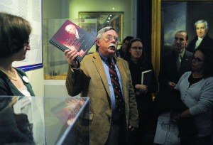 Daniel Preston, editor of the Papers of James Monroe, talks with visitors about the recently released Volume 5. Photo by Suzanne Carr Rossi, Free-Lance Star