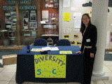student at reception desk