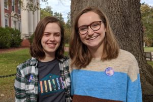 two female students with I voted stickers