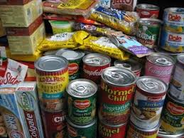 this is a picture of several cans of food, including chili, beans, and pineapple.