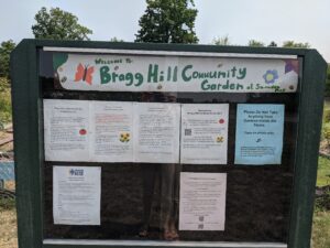 Sign that says "Bragg Hill Community Garden".