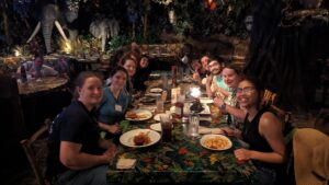 ASB students eat dinner at Rainforest Cafe on their 2024 trip to Florida. 