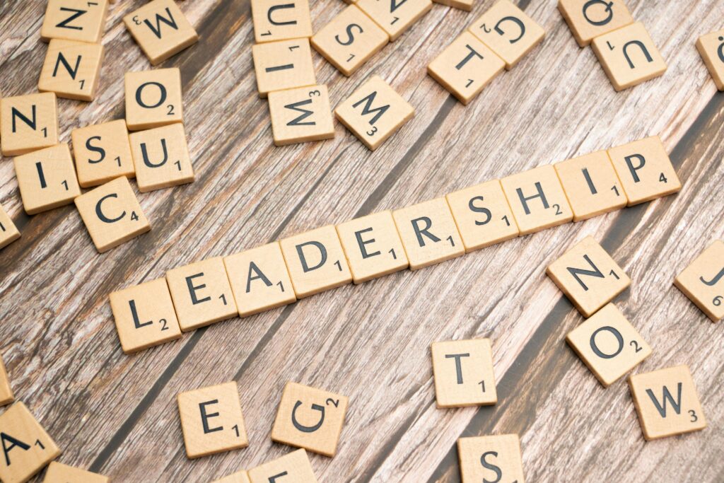 Scrabble tiles arranged to say "leadership"