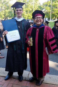 Drew Mesa and Dr. Nabil Al-Tikriti at Commencement, sharing Vance Award