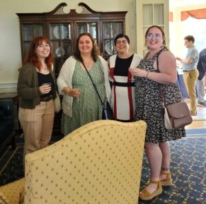 Group portrait of graduating students with Dr. Allyson Poska