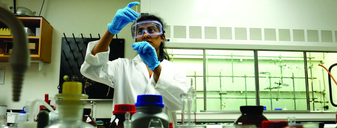 Rachel Sunder working on a chemistry research project