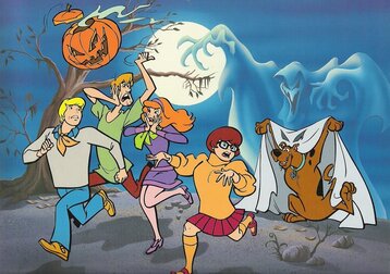 Scooby-doo characters running from Scooby dressed as a ghost.
